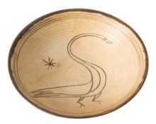 *Bernard Forrester [1908-1990] a porcelain dish: of shallow circular form tubelined with a sinuous