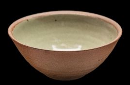 A St Ives stoneware bowl: of circular form, the interior under celadon glaze, impressed seal, 14.