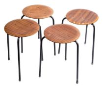 A set of four stacking 'Ant' stools by Arne Jacobson (1902-1971): the circular laminated seats