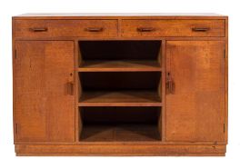 An oak dining suite of Heals type:,