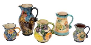 *Paul Jackson (Contemporary) five terracotta jugs: of various forms each with a strap handle and