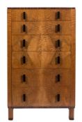 An Art Deco walnut upright chest attributable to Waring and Gillow:,