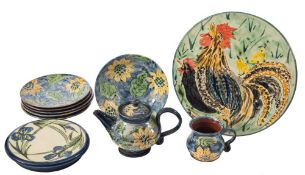 *Paul Jackson (Contemporary) a group of terracotta domestic items: comprising two cake stands,