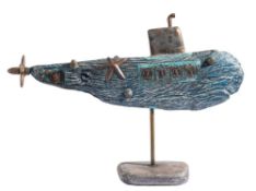 * Liam Ball [b.1964]- Submarine,:- carved and painted driftwood and metal 90cm long.