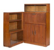 A 'Minty' oak corner bookcase:, with a three section, having glazed (sliding) doors, 71cm wide,