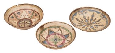*Bernard Forrester [1908-1990] three porcelain dishes: of shallow circular form incised and