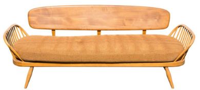 An Ercol elm and beech settee,