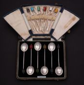 A set of six silver and enamel Art Deco period cocktail sticks: stamped silver, cased,