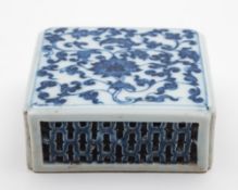 A Chinese blue and white reticulated stand: of square section with pierced sides,