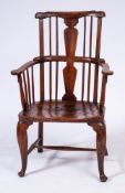 An 18th Century elm and fruitwood comb back Windsor elbow chair:,