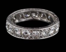A diamond eternity ring: pave-set with sixteen round,