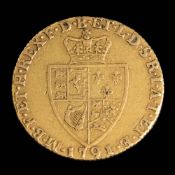A George III spade guinea dated 1791.