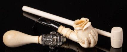 An Edwardian ivory and silver mounted handle: the ovoid handle mounted with the silver head of a