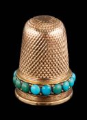 A late 19th century gold thimble: with a band of circular turquoise,