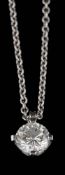An 18ct white gold and diamond single-stone pendant: the round brilliant-cut diamond 5.