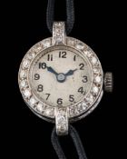 A lady's Art Deco diamond set cocktail wristwatch: the dial with Arabic numerals set with