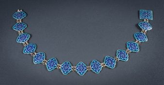 A blue champleve enamelled silver belt: of oval links, possibly Persian,