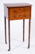 An early 19th Century mahogany and inlaid work table:, bordered with boxwood and ebony lines,