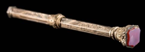 A 19th century gold-sleeved brass propelling pencil: with detachable seal end revealing lead