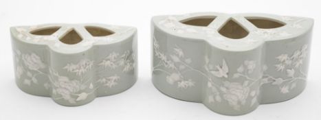 Two Royal Worcester celadon ground 'Japanese' flower- holders: in two sizes,