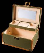 A jewellery box of faux snake skin design: with cream interior and mirror, together with key.