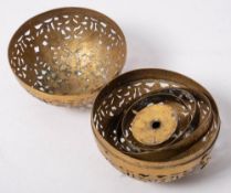 An 18th/19th century Indian brass hand warmer: of spherical form,