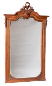A Continental carved walnut pier mirror:,