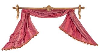 A French carved giltwood curtain pole:,