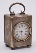A George V silver cased bedside timepiece, maker's mark worn, Birmingham, 1916: initialled,