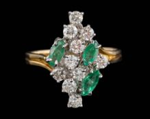 An 18ct gold, emerald and diamond cluster ring: set with marquise-shaped emeralds and round,