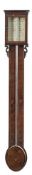 T Naylor, Halifax, a mahogany stick barometer: the painted dial with usual barometer markings,