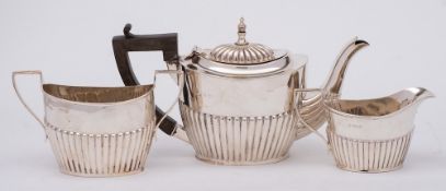 An Edward VII silver three-piece bachelor's tea service, maker William Aitken, Birmingham,