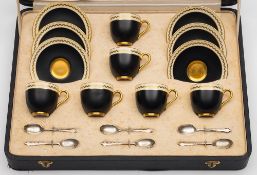 A cased set of six Royal Worcester porcelain coffee cups,