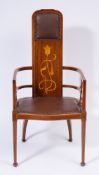 An Art Nouveau inlaid mahogany occasional armchair:, bordered with boxwood lines,