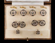 A suite of black enamelled, crystal and diamond set cuff-links,