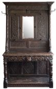 A 19th Century carved oak hallstand incorporating some earlier timbers:,