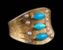 A turquoise and seed pearl ring: set with three oval turquoise between single seed pearl rows,