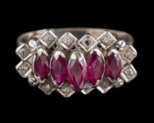 An Art Deco ruby and diamond cluster ring: set with marquise-shaped rubies within a surround of