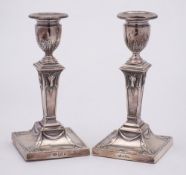 A pair of Edward VII silver candlesticks, maker Goldsmiths & Silversmiths Co Ltd, London,
