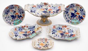 An early Mason's Patent Ironstone part dessert service: of moulded scroll and foliate form,