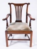 An 18th Century oak and mahogany elbow chair:,