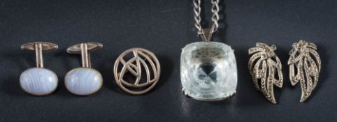 A pale blue topaz single-stone pendant on silver chain,: a pair of marcasite clip earrings,