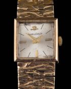 A lady's 9ct gold quartz movement wristwatch: with Jaeger-LeCoultre dial and crown on a 9ct gold