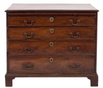 A George III mahogany rectangular chest:, the top with a moulded edge,