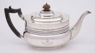 A George V silver teapot, maker Edward Barnard & Sons, London, 1911: bearing Prideaux family crest,