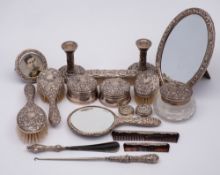 A collection of matched silver dressing table items, various makers and dates: includes,