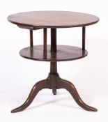 An 18th Century oak circular two tier occasional table:, with graduated tops and turned uprights,