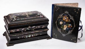 A Victorian papier mache and mother-of-pearl inlaid tea caddy: of sarcophagus outline,
