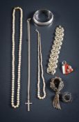A cultured pearl necklace and a simulated pearl necklace, two costume brooches, a pendant,