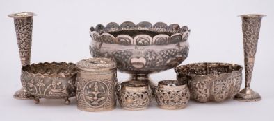 An Indian Silver pedestal bowl: with embossed village scene decoration 13.